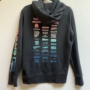 Hollister Multi Logo Graphic Pullover Hoodie Sweatshirt Black Women's Size S
